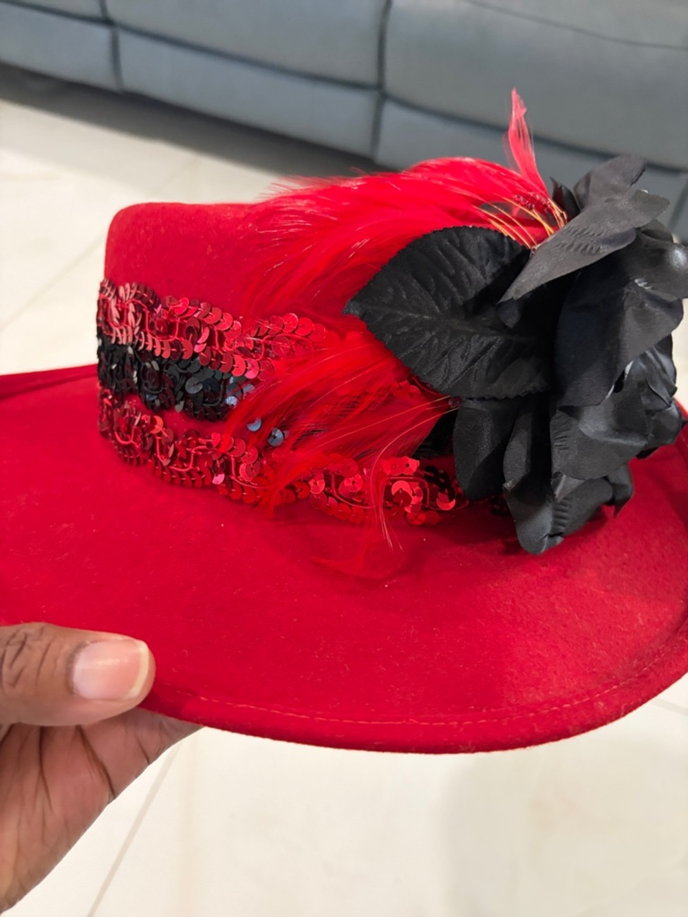 Red Feathered Sequin Fascinator Hat with Black Flower